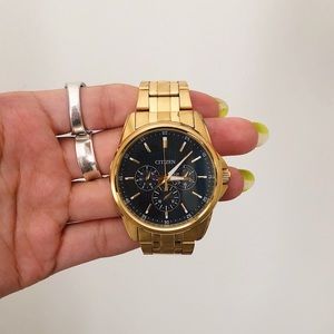 Citizen men’s 42mm gold tone bracelet watch